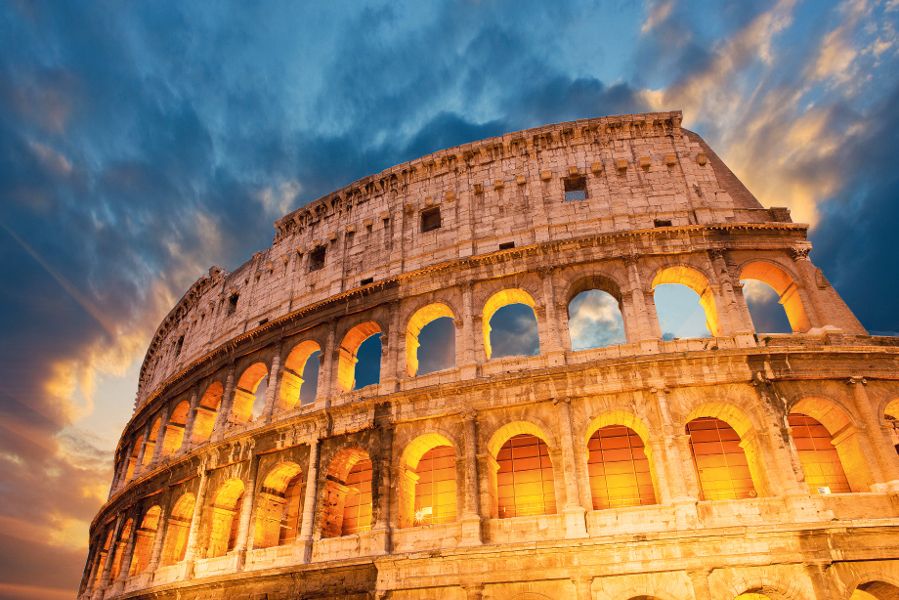 Wonderful view of Colosseum in all its magnificience - Autumn sunset in Rome - Italy